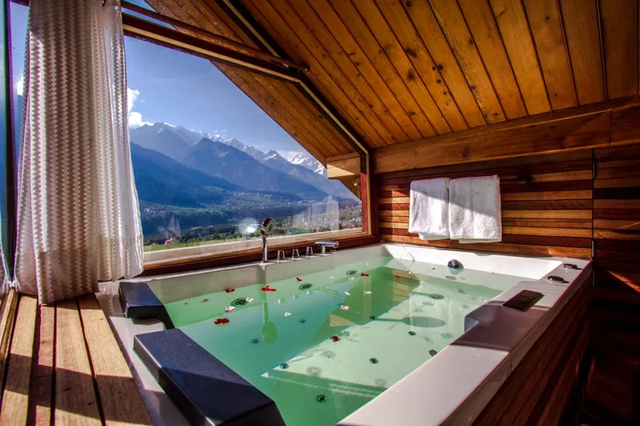 Luxury cottage with valley view,mountain face jacuzzi and large open sitout